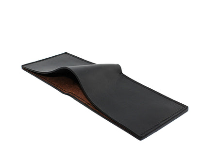 Black leather wallet on a light gray background