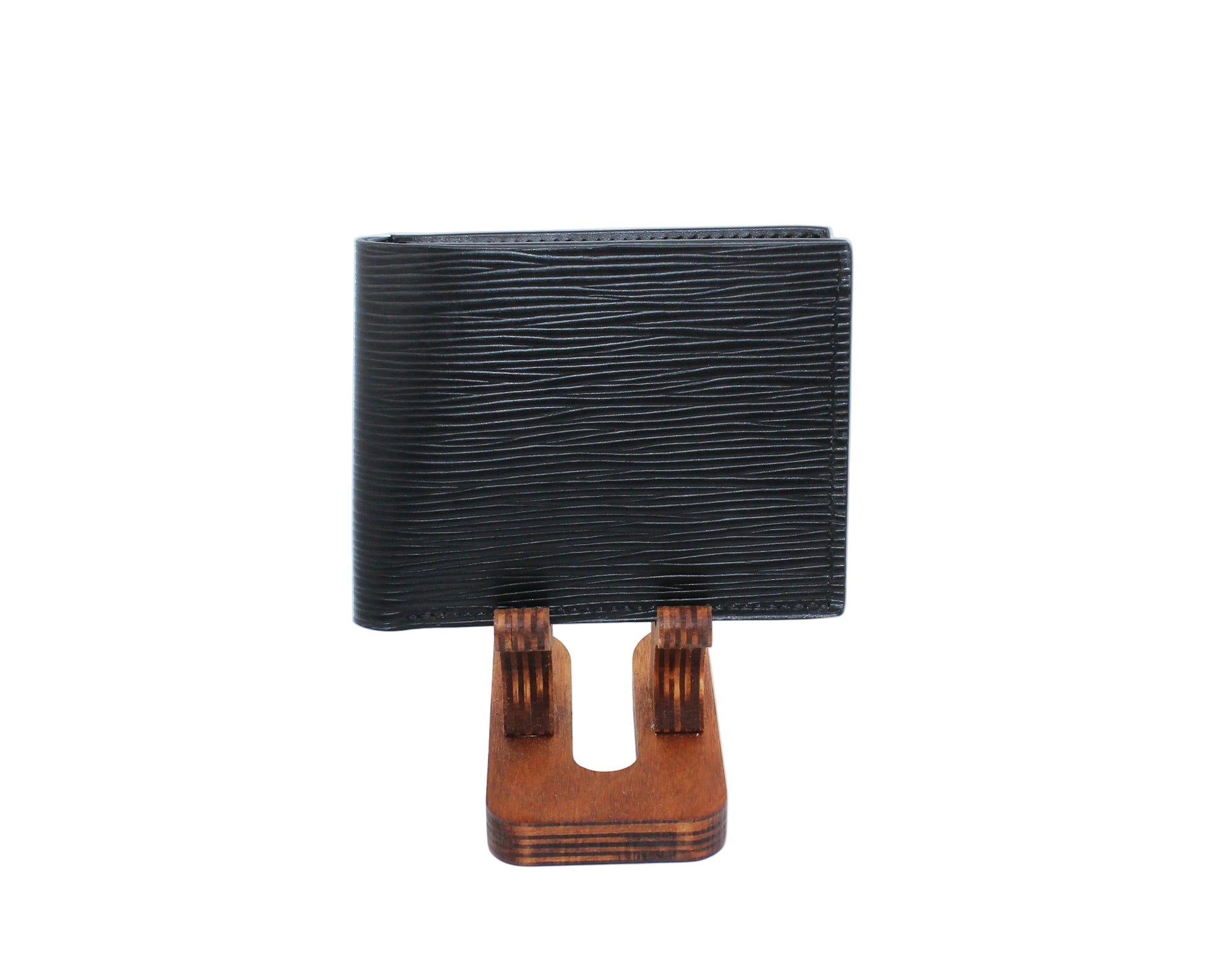 Black leather wallet on a white background