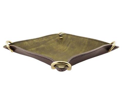 Green leather tray with gold accents on a white background