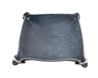 Dark blue leather tray with metal accents on a white background