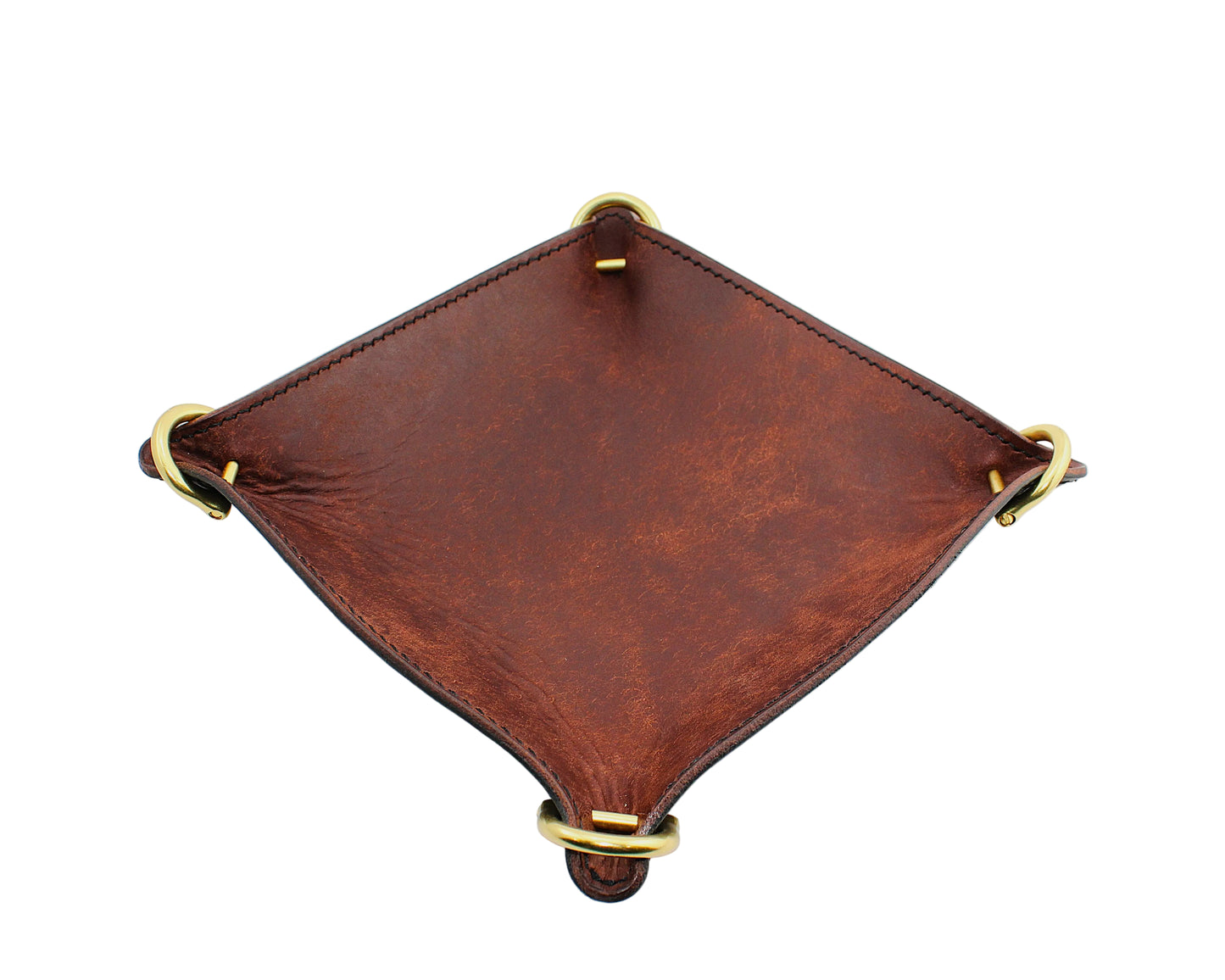 Brown leather tray with gold accents on a white background